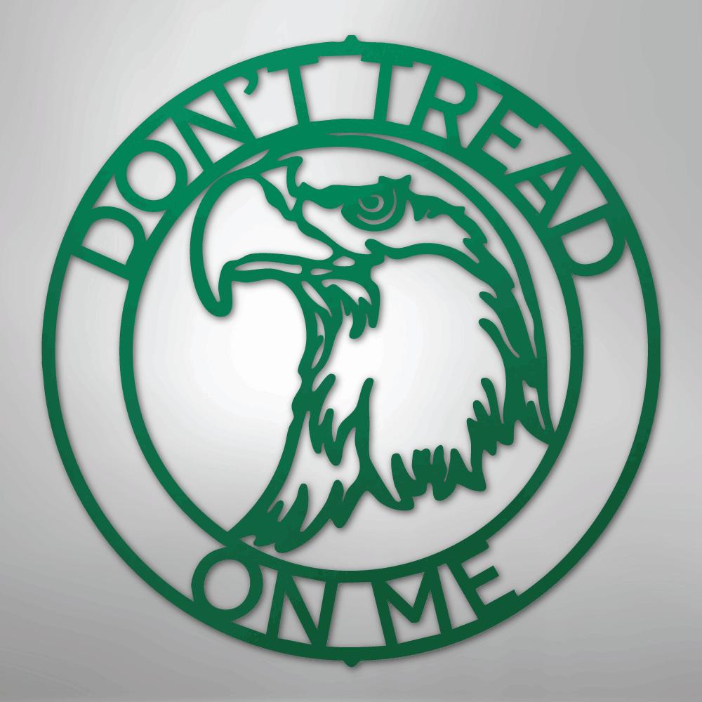 Green metal wall art: "Don't Tread On Me" text encircles an eagle head design.