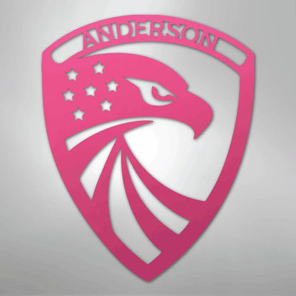 Pink custom metal wall art with an eagle head, stars, and "ANDERSON" text.