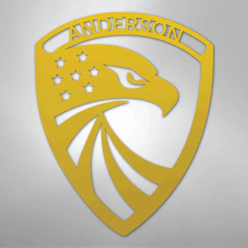 Gold metal wall art: Modern Eagle Monogram shield with "ANDERSON" and stars.