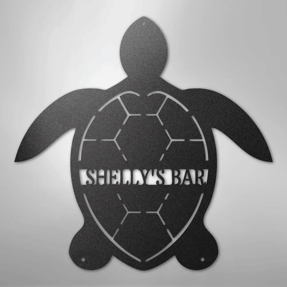 Black metal turtle monogram wall art with "SHELLY'S BAR" cut out, featuring a detailed shell design.