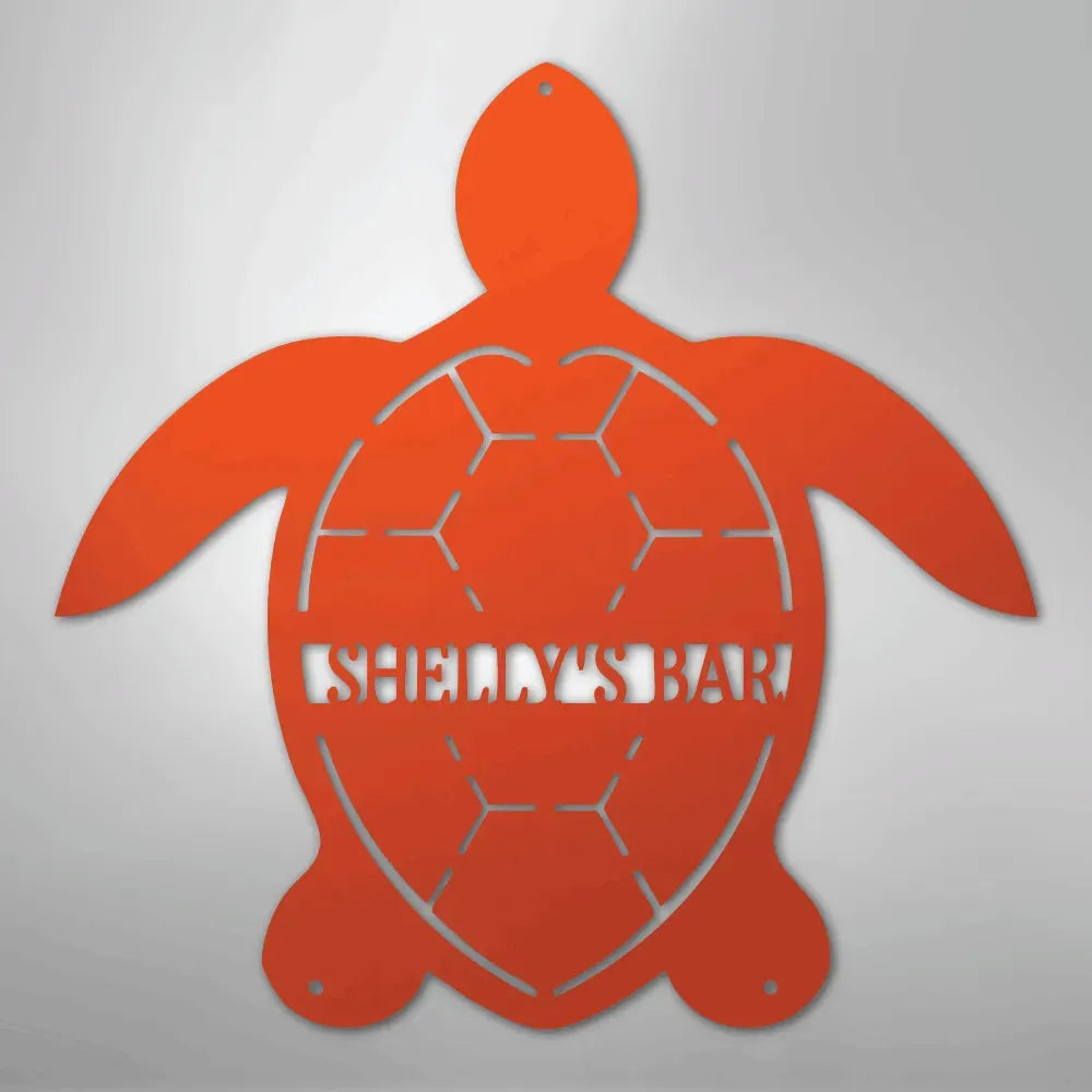 Orange metal turtle monogram wall art with "SHELLY'S BAR" cut out of the shell.