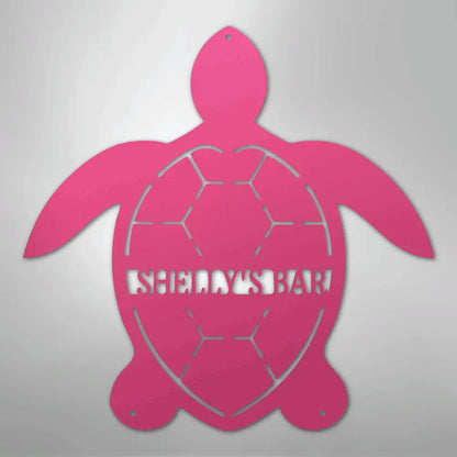 Pink metal turtle wall art with "SHELLY'S BAR" cutout, featuring a honeycomb shell design.