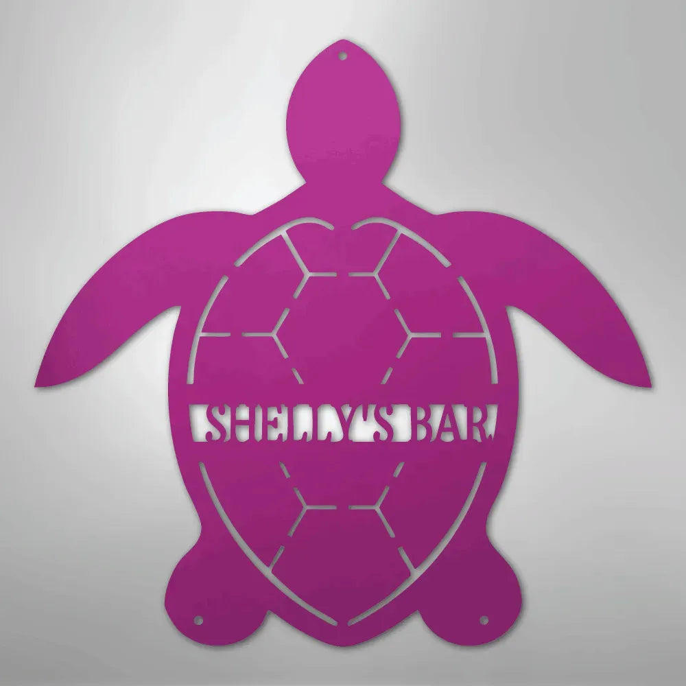 Pink metal turtle wall art with "SHELLY'S BAR" cut out, featuring a honeycomb shell design.