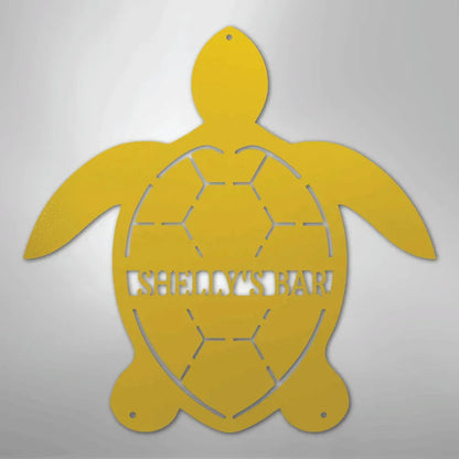 Yellow metal turtle wall art with "SHELLY'S BAR" cut out, featuring a honeycomb shell design.