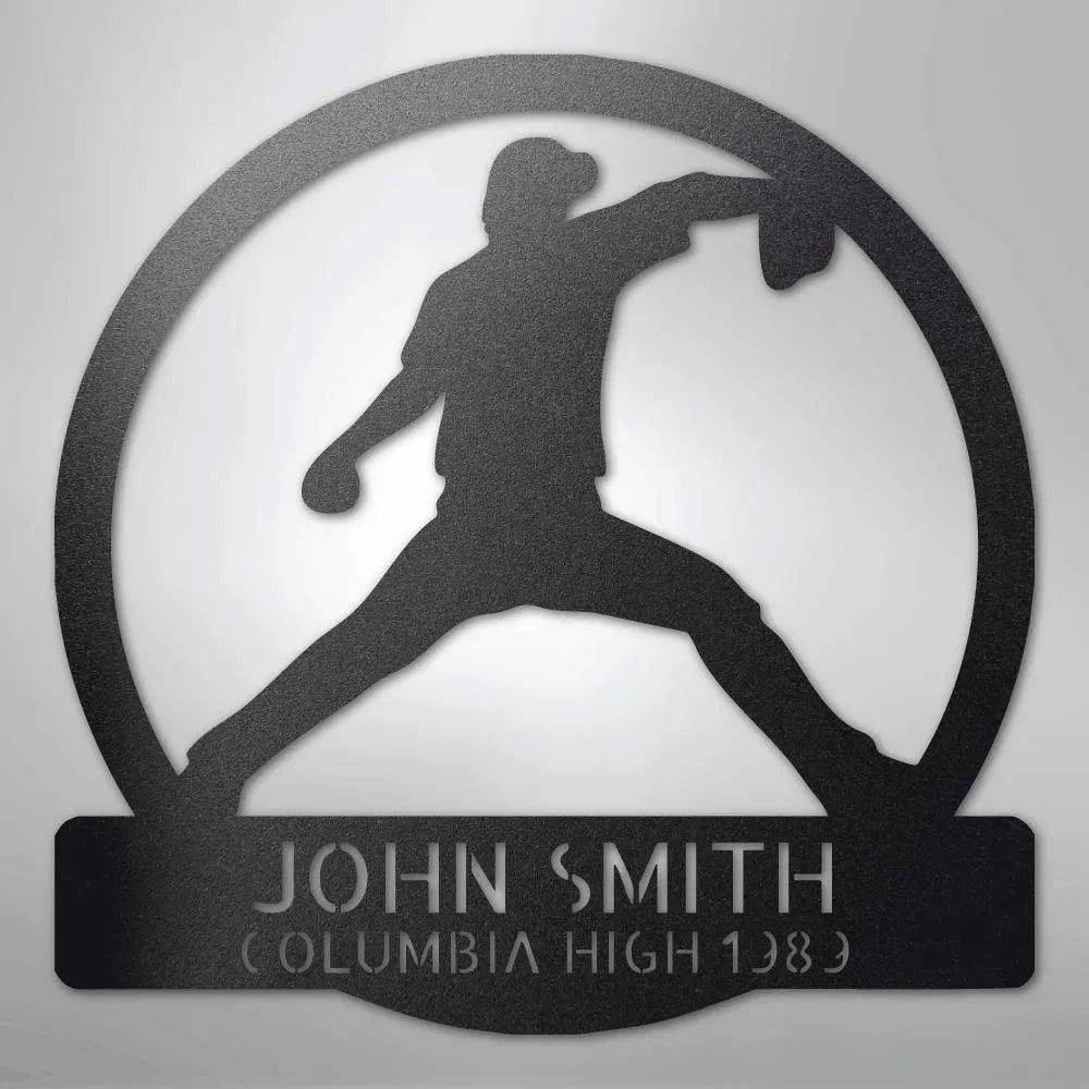 Black metal wall art with a baseball pitcher silhouette in a circle, personalized with "JOHN SMITH COLUMBIA HIGH 1989".