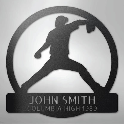 Black metal wall art with a baseball pitcher silhouette in a circle, personalized with "JOHN SMITH COLUMBIA HIGH 1989".