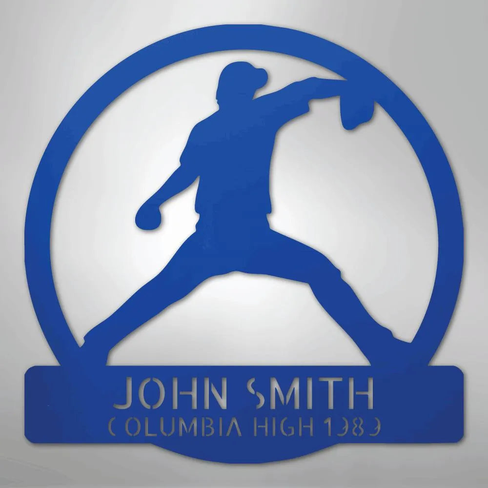 Blue metal wall art featuring a baseball pitcher silhouette within a circle, personalized with "JOHN SMITH" and "COLUMBIA HIGH 1989".