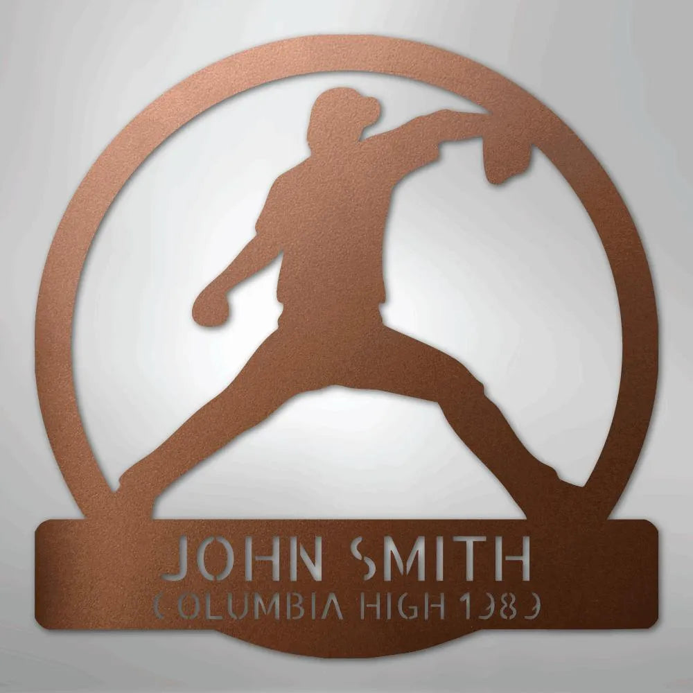 Copper metal wall art with a baseball pitcher silhouette in a circle, personalized with "JOHN SMITH" and "COLUMBIA HIGH 1989".