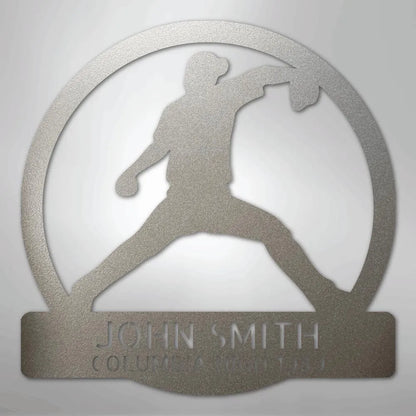 Silver metal wall art with a baseball pitcher silhouette in a circle, personalized with "JOHN SMITH" and "COLUMBIA (TN)".