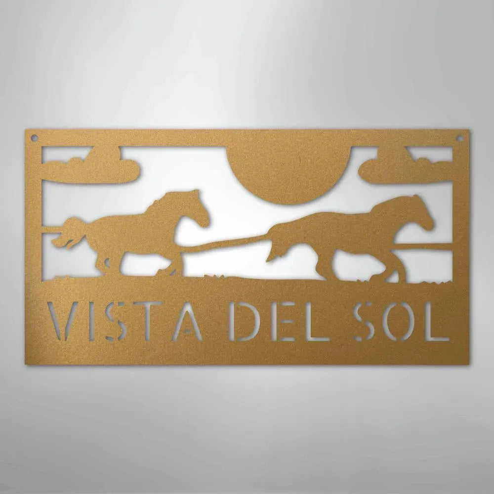 Bronze metal sign with two racing horses, sun, clouds, and "VISTA DEL SOL" cutouts.