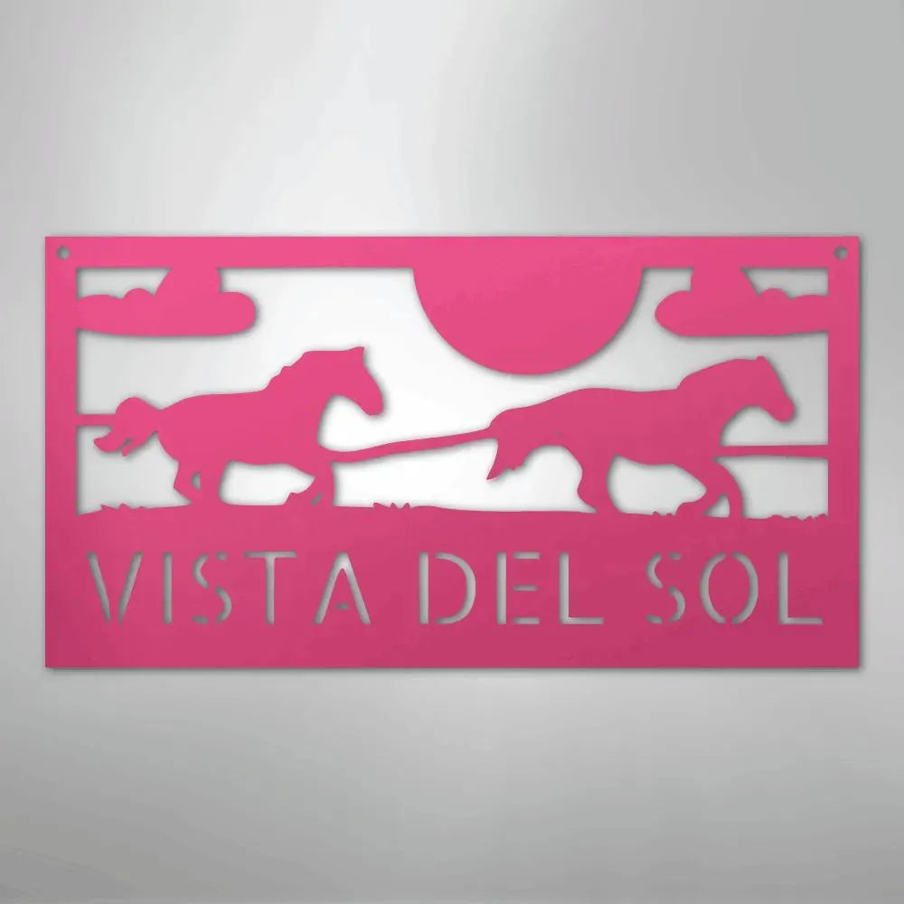 Pink metal sign with racing horse silhouettes, sun, clouds, and "VISTA DEL SOL" text.