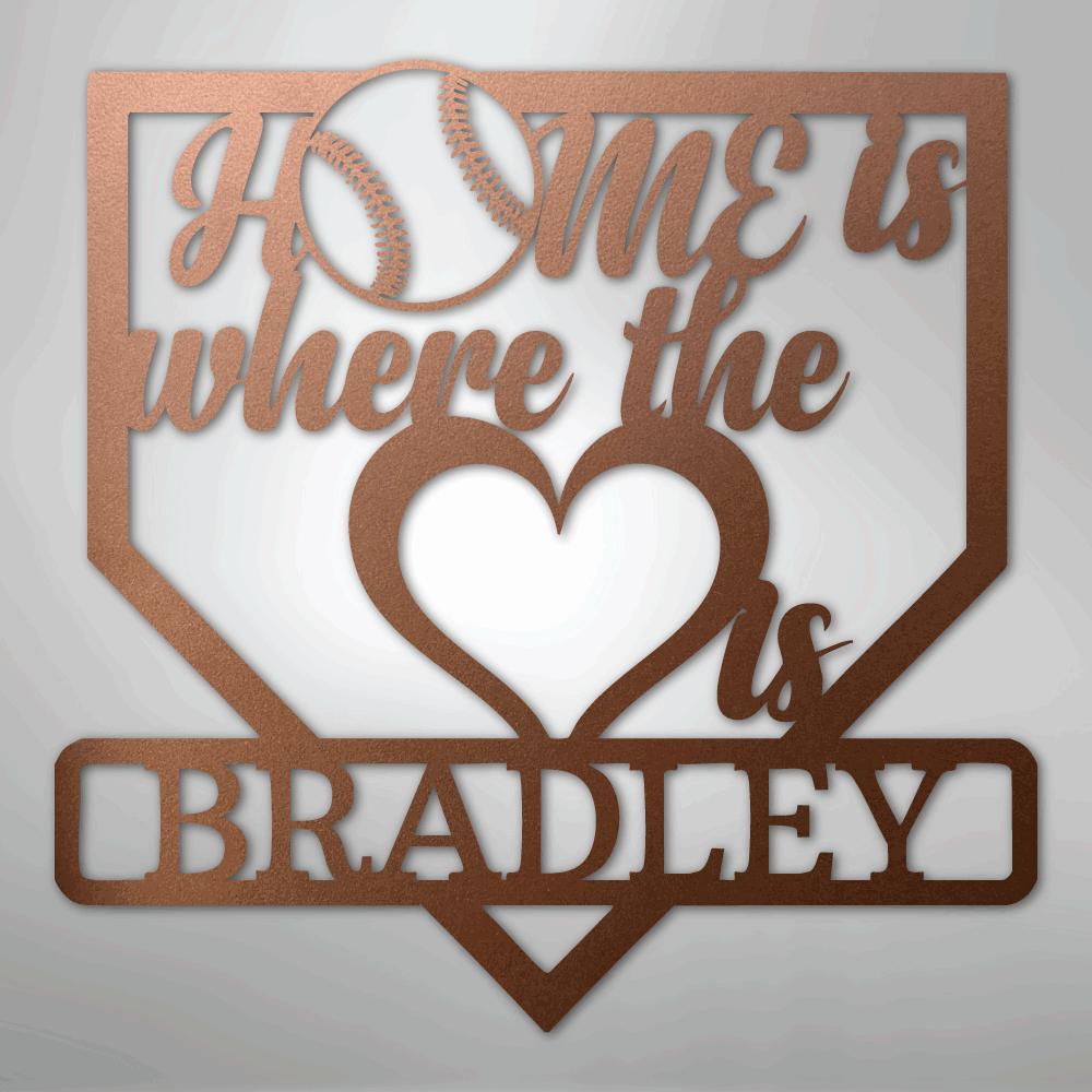 Copper metal baseball home plate sign with "Home is where the heart is Bradley" text.