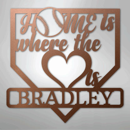 Copper metal baseball home plate sign with "Home is where the heart is Bradley" text.