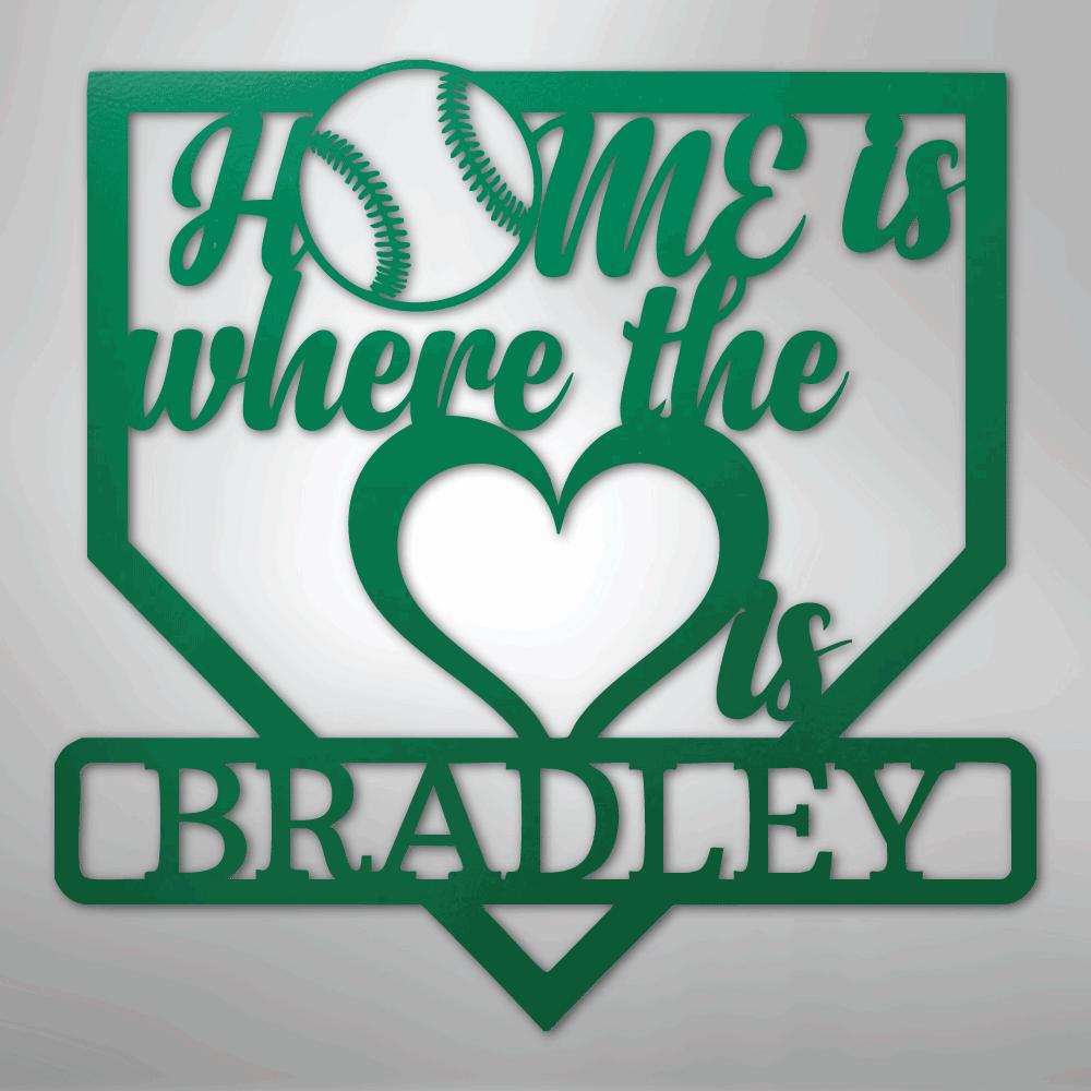 Green metal baseball home plate sign with "Home is where the heart is Bradley" and a baseball.