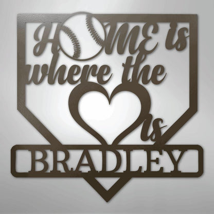 Brown metal baseball home plate sign with "Home is where the heart is Bradley" text and a baseball.