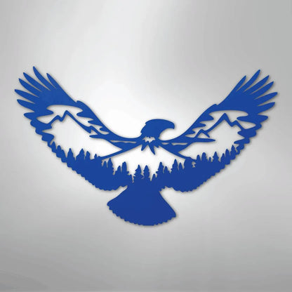 Blue metal wall art featuring an eagle silhouette with mountains and pine trees within its wings.