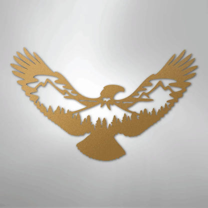Bronze metal wall art of an eagle with mountains and pine trees cut out of its body.