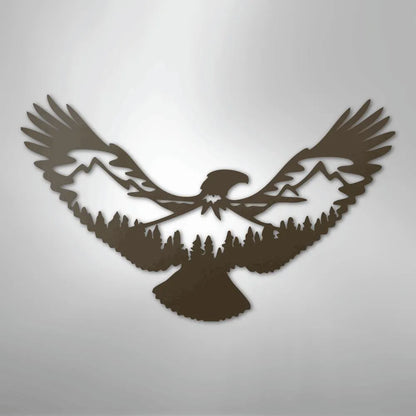 Brown metal wall art of an eagle with mountains and pine trees forming its wings and body.