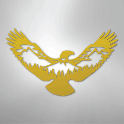 Golden metal wall art featuring an eagle silhouette with mountains and pine trees within its wings.