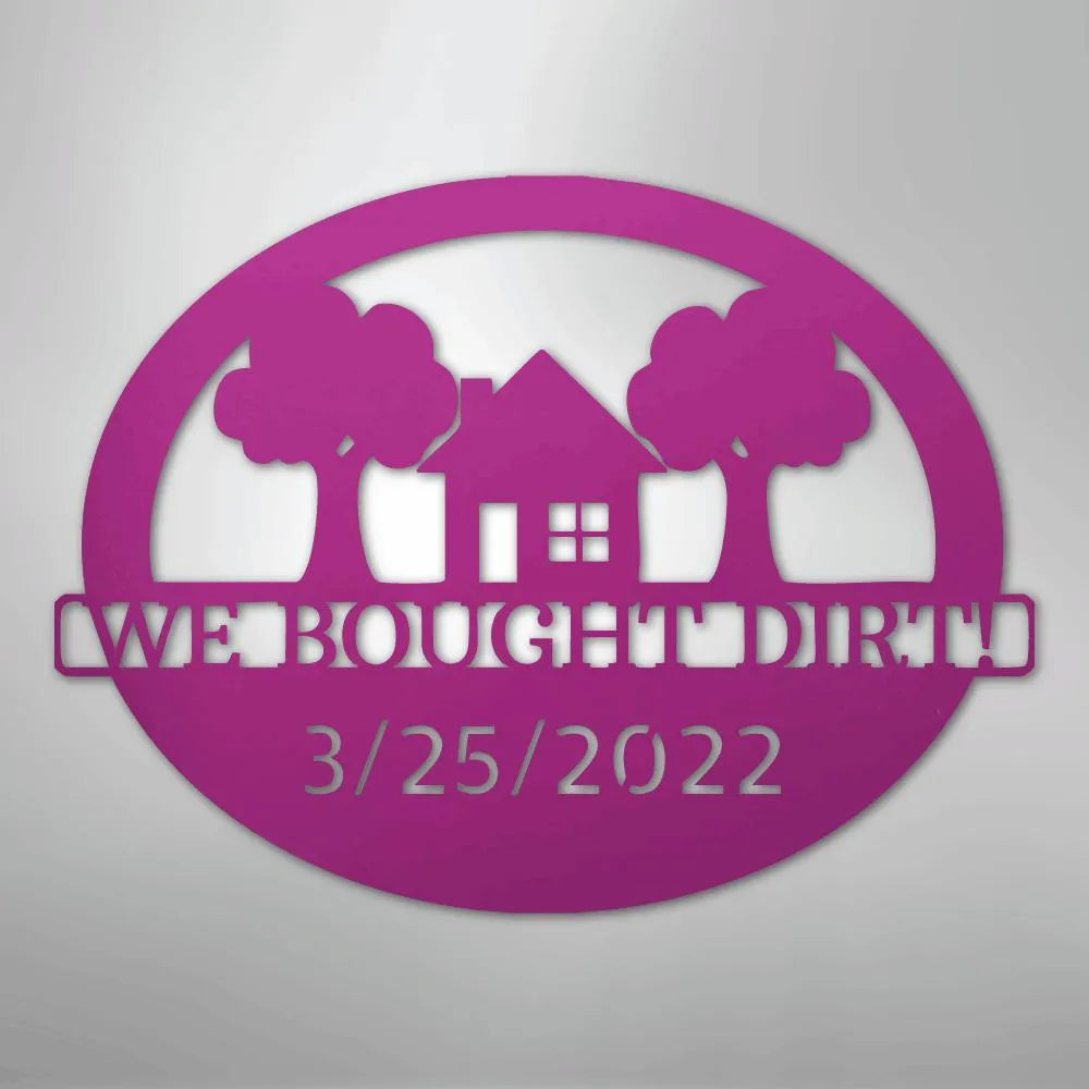Pink oval metal wall art with "WE BOUGHT DIRT" and "3/25/2022" text, house, and trees.