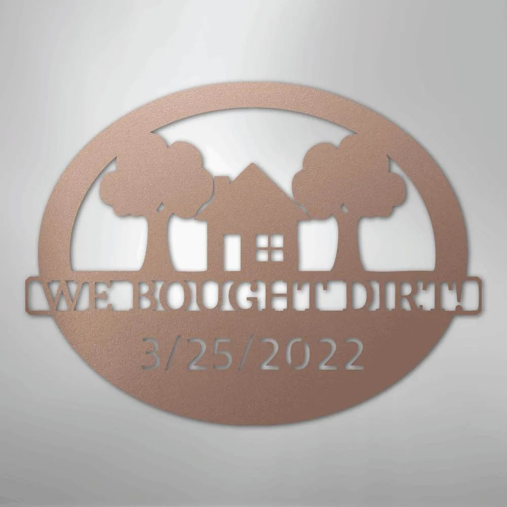 Rose gold metal wall art with "WE BOUGHT DIRT" and "3/25/2022" text, house, and trees.