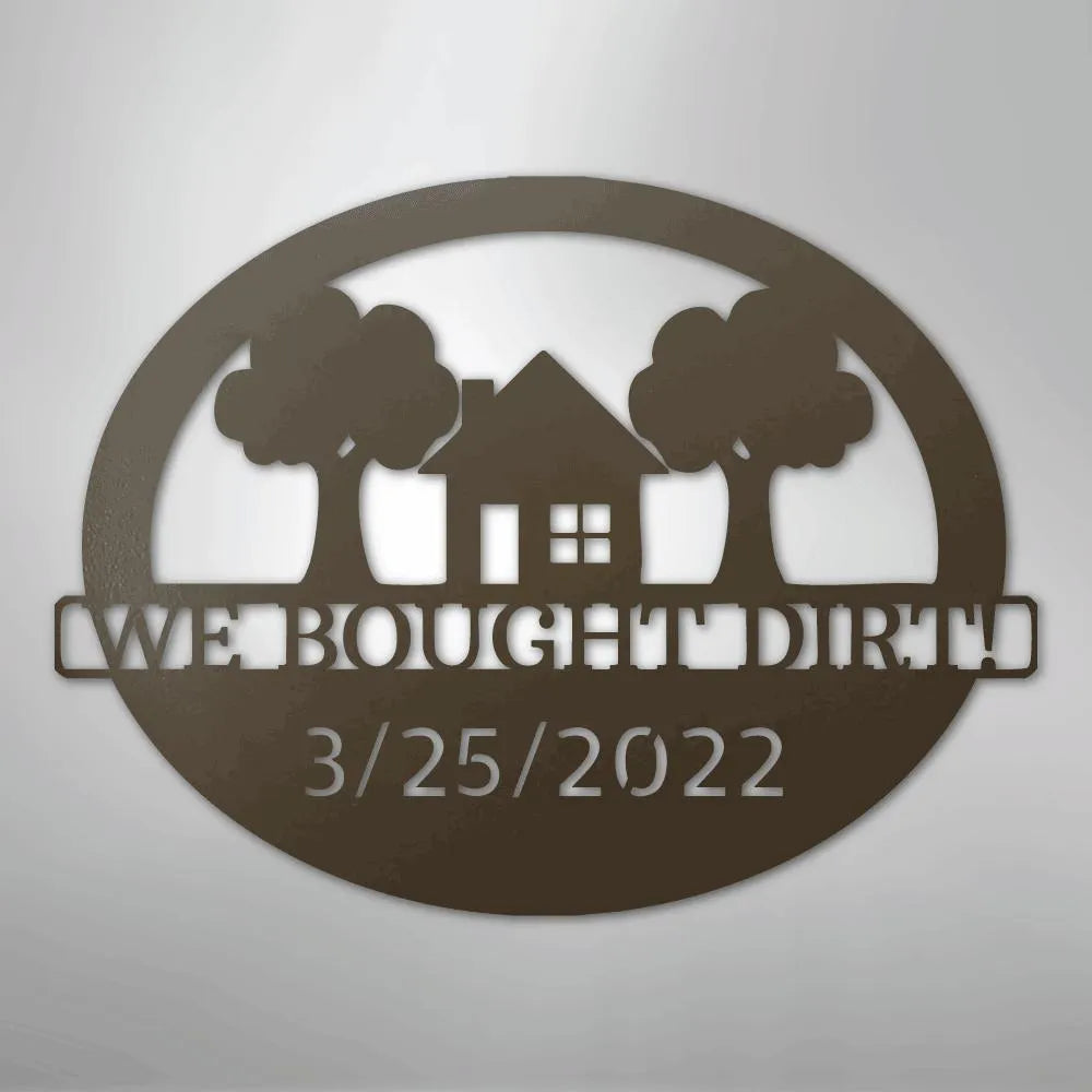 Brown oval metal wall art with a house, two trees, "WE BOUGHT DIRT!", and "3/25/2022".