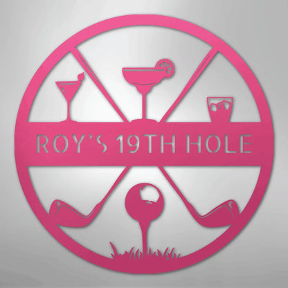 Pink personalized metal "ROY'S 19TH HOLE" sign with golf clubs, ball, and cocktail glasses.