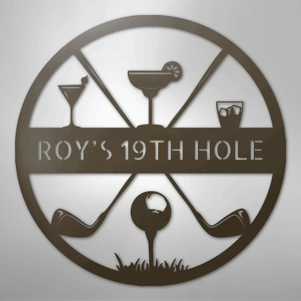 Bronze metal "ROY'S 19TH HOLE" monogram sign with golf clubs, ball, and cocktail glasses.