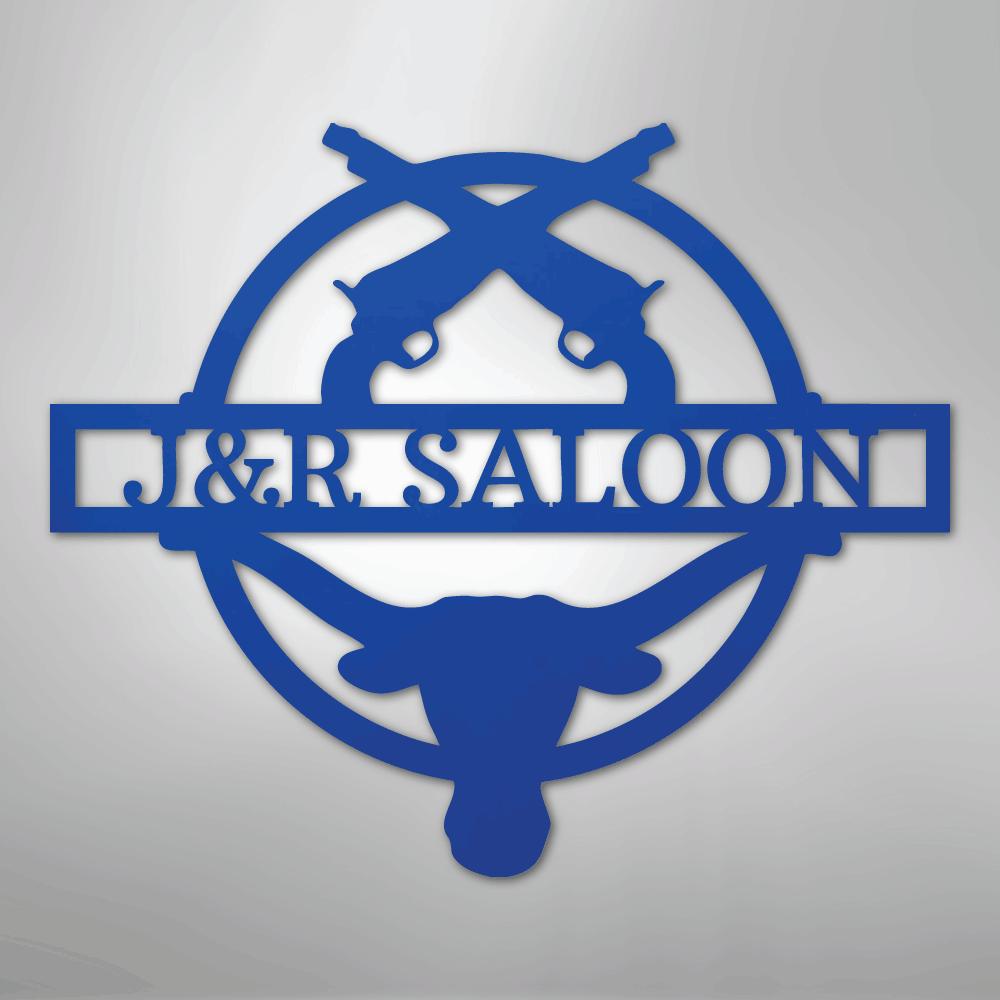 Blue metal "J&R Saloon" monogram with crossed pistols and a longhorn skull design.
