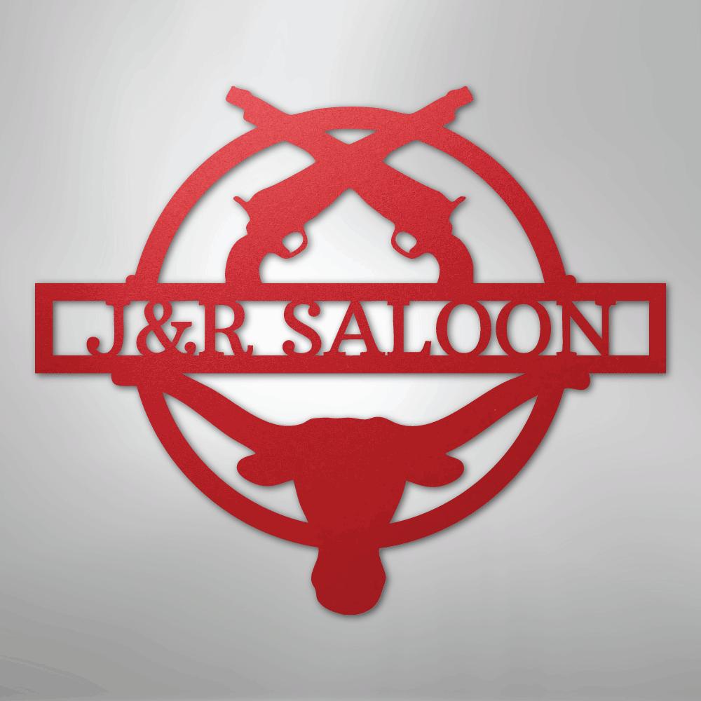 Red metal "J&R SALOON" monogram with crossed pistols and a longhorn skull design.