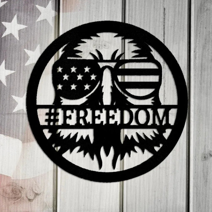 Black steel American Eagle Monogram wall decor with sunglasses featuring US flag design and "FREEDOM" text.