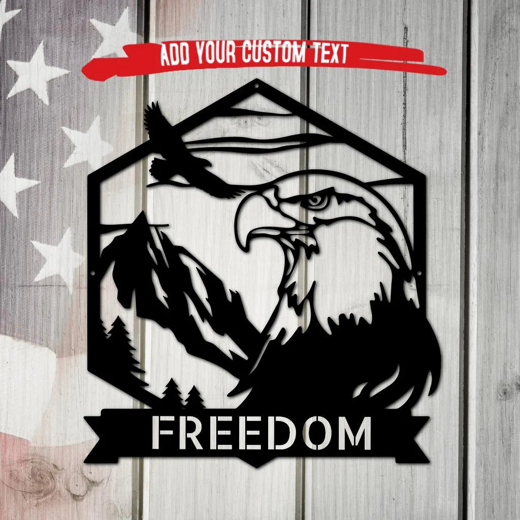 Black metal bald eagle monogram wall art with mountains, trees, and "FREEDOM" banner, on a distressed American flag background.