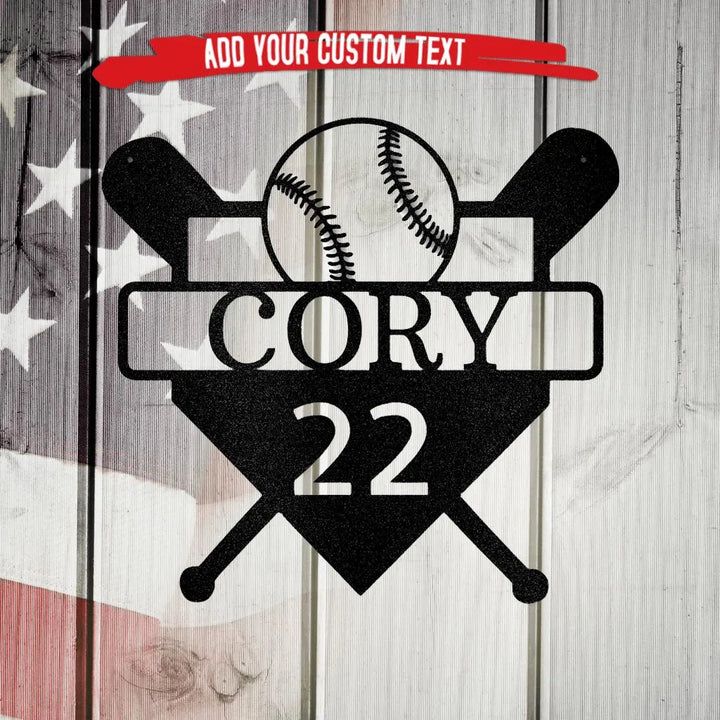 Black metal baseball monogram with bats, ball, and customizable name/number, on a rustic wood background.