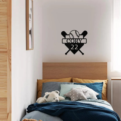 Black metal baseball monogram wall art with bats, ball, and customizable name "CORY 22" above a bed.