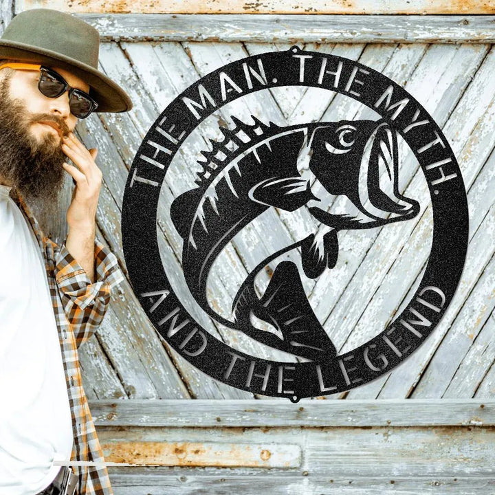 Black metal bass fish monogram wall art with "THE MAN. THE MYTH. AND THE LEGEND" text.