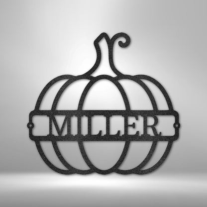 Black metal pumpkin wall art with "MILLER" cutout in the center.