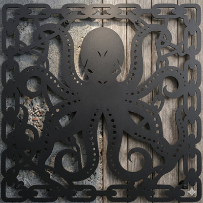 Decorative metal octopus wall art on a textured surface