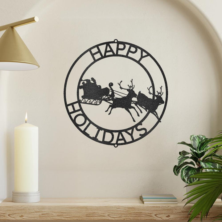 Black metal "Happy Holidays" wall art with Santa's sleigh and reindeer in a circular design.
