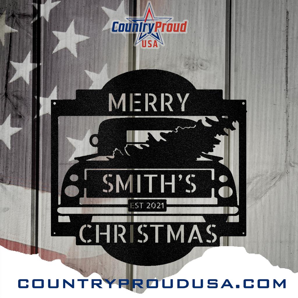 Black metal Christmas truck monogram with "Merry Smith's Christmas Est 2021" text, featuring a tree in the truck bed.