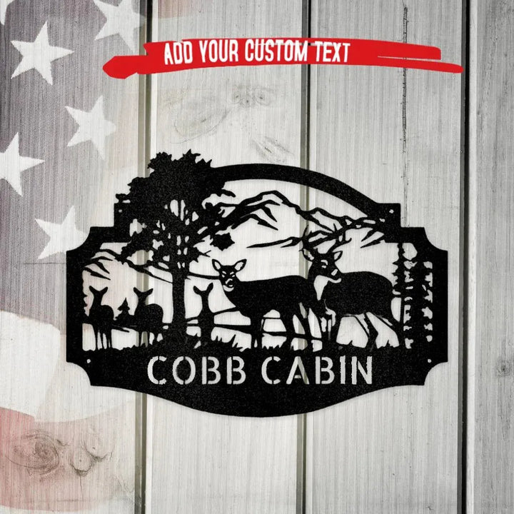 Black metal deer family monogram wall art with mountains and "COBB CABIN" text.