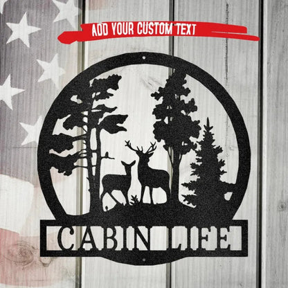 Black metal wall art featuring a deer and doe in a forest, with "CABIN LIFE" text below.
