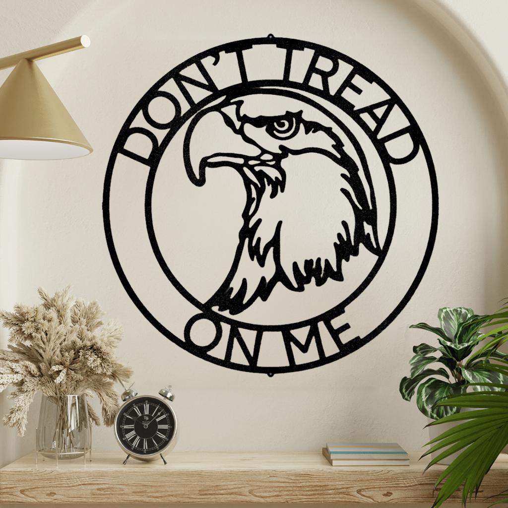 Black metal "Don't Tread on Me" Gadsden flag eagle head ring monogram wall art.