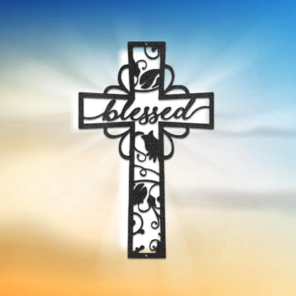 Black metal cross wall art with "blessed" script and intricate vine cutouts.