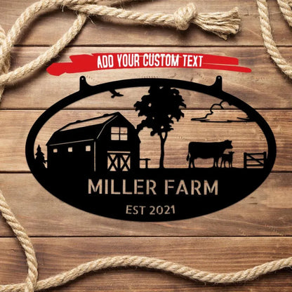 Black metal oval wall art with a barn, cow, calf, tree, and custom text "MILLER FARM EST 2021".