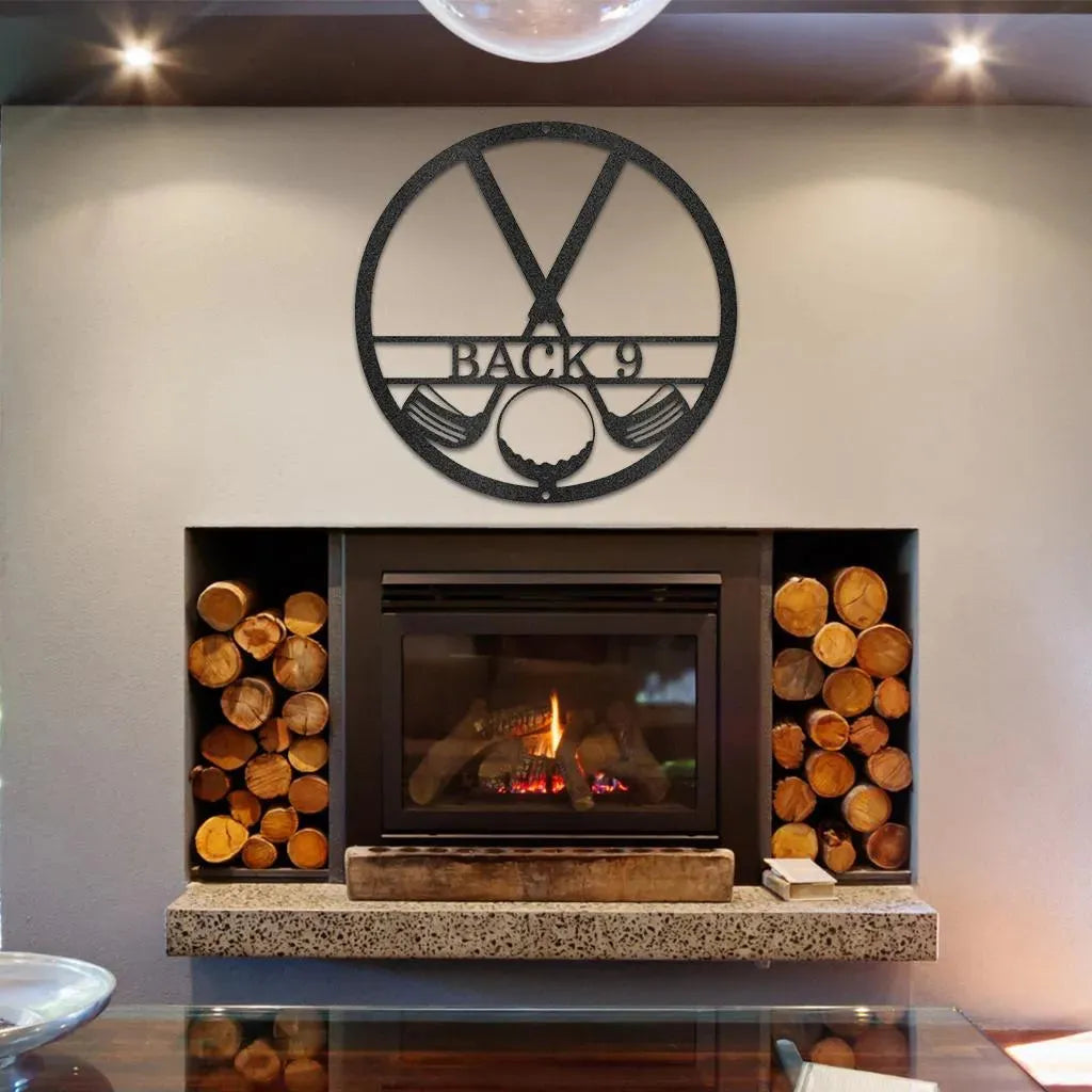 Black metal art of crossed golf clubs, ball, and "BACK 9" in a circle, mounted above a fireplace.