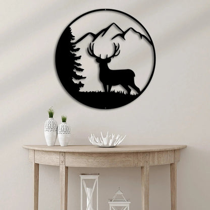 Black metal wall art: circular deer silhouette with mountains and pine tree.