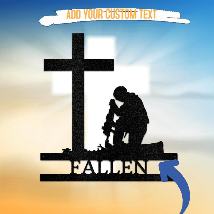 Black metal wall art of a kneeling soldier before a cross, with "FALLEN" text.