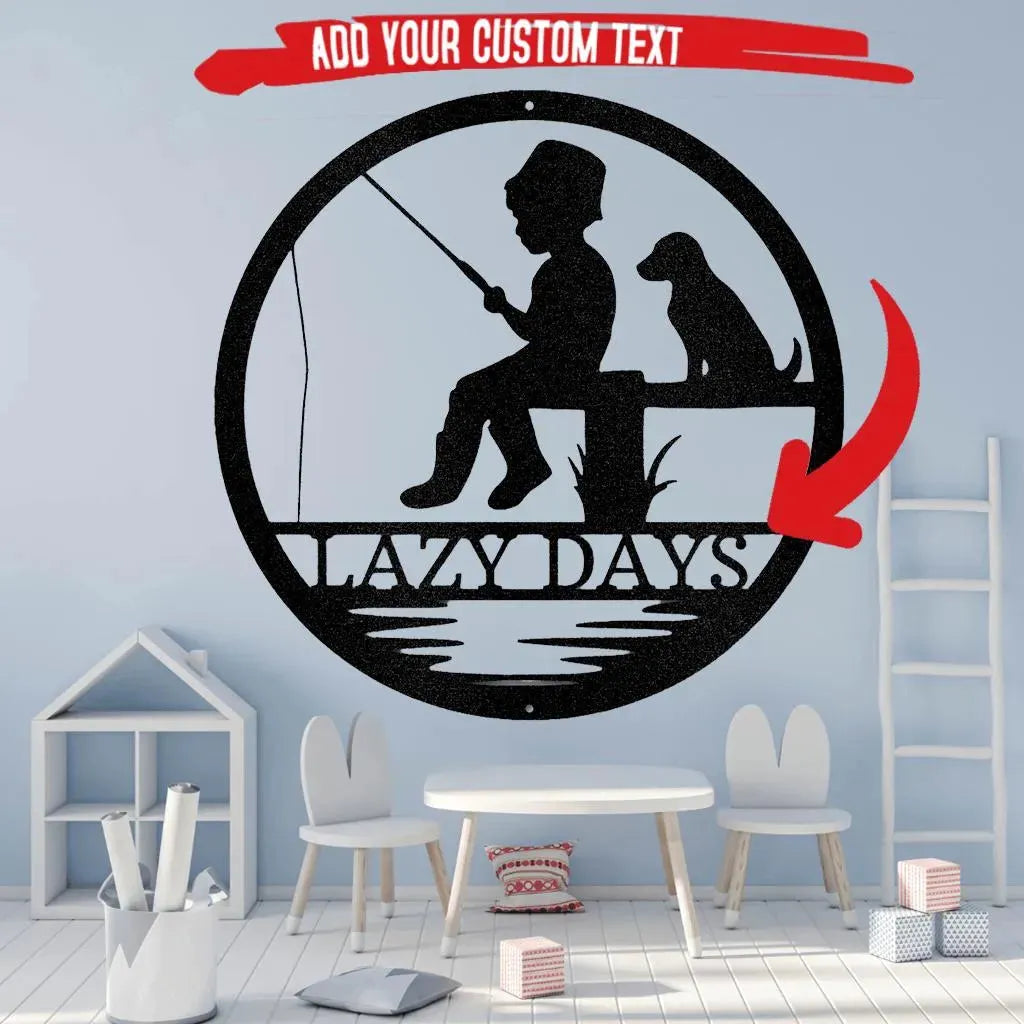 Black metal wall art: boy fishing with dog, "LAZY DAYS" text, in a circular design.