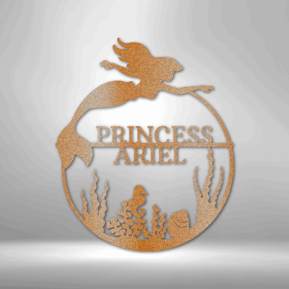 Copper mermaid metal wall art with "Princess Ariel" text, seaweed, and seahorse details.