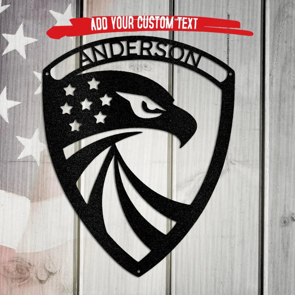 Black metal eagle monogram wall art with stars and "ANDERSON" text on a wood and flag background.